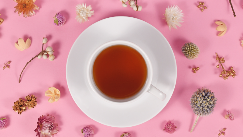 cup of tea on a pink background