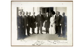 Katharine Wright poses with President James Taft, her brothers Orville and Wilbur Wright, and several other dignitaries.