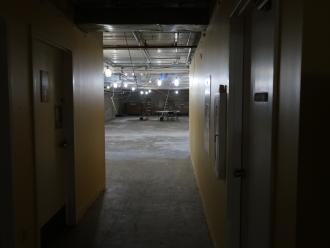 View of construction in basement wall between teens and community room is removed