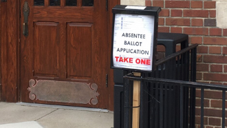 ballot applications in box outside library door
