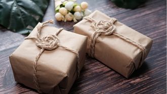 artful gifts wrapped with brown paper and twine